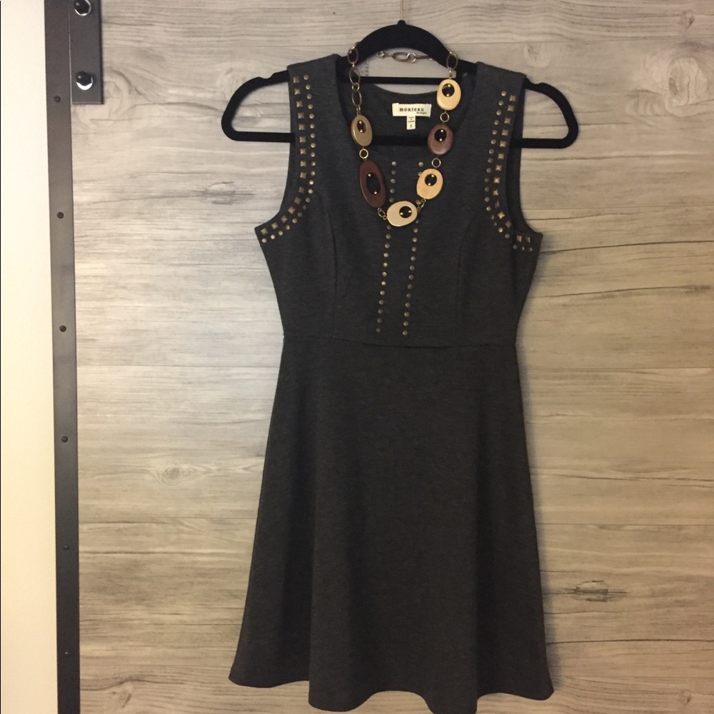 Cute gray knit dress and necklace.